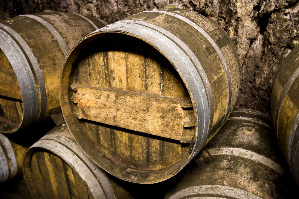 Wine barrels closeup. Barrels in a cellar.