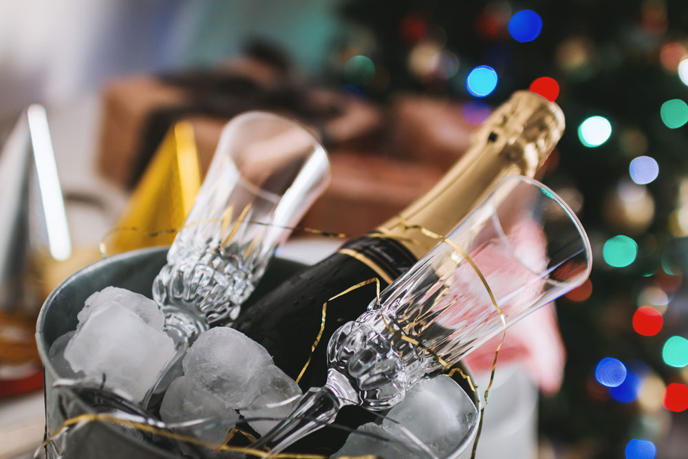 Champagne and Champagne glasses in ice bucket