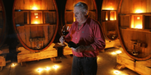 best Malbec wines - Jean Bousquet of Domaine Bousquet holding a wine glass